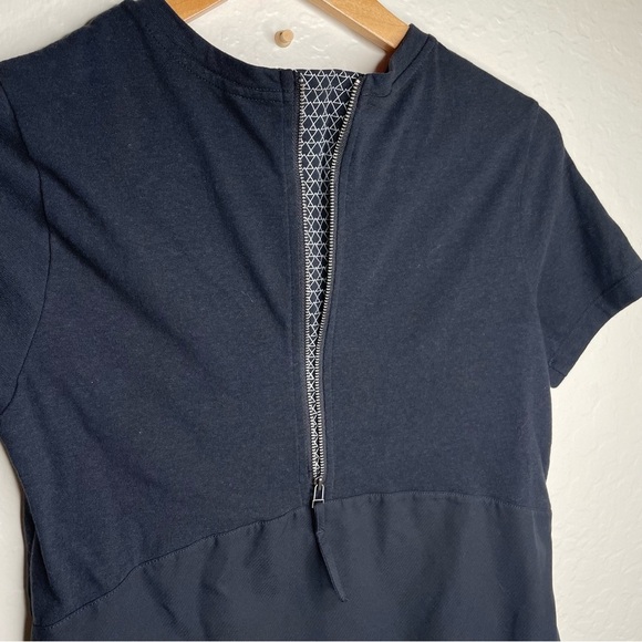 Pearl Izumi Woman’s M Scape Top Black Tee Bioviz Lower Rear Hem Angled Shoulder - Picture 6 of 8